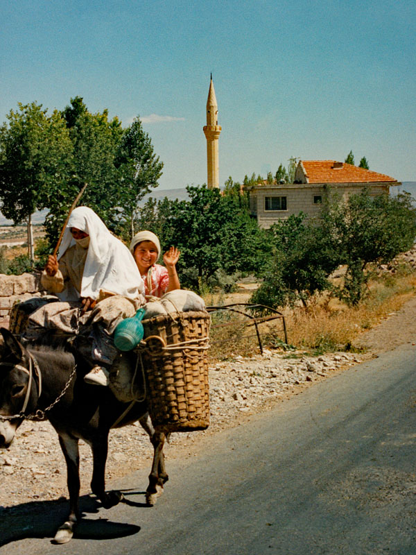 Mother an daughter on donkey